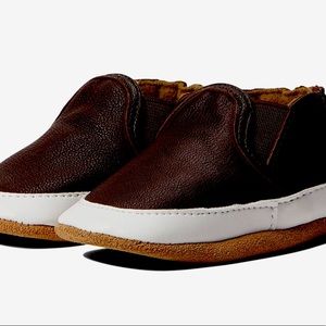 New in original packaging. Brown leather loafer size 6-9 mo.